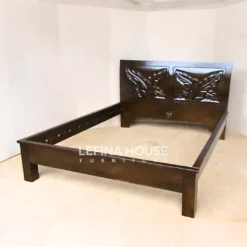 Tempat Tidur Minimalis Daun Terbaru dengan finishing salak tua dan ukiran daun artistik pada headboard - LDTT014