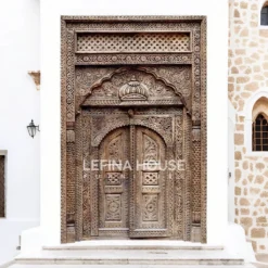 Gebyok ukir kayu jati klasik dengan detail ukiran Jepara dan finishing melamine natural elegan