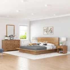Set tempat tidur minimalis dari kayu jati dengan finishing melamine natural, termasuk dipan, nakas, dan meja rias