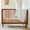Tempat Tidur Bayi bergaya Mid-Century Modern dari bahan Kayu Jati asli.