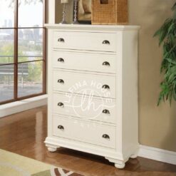 Lemari laci klasik YOBA027 warna putih gading dengan 5 laci dan kaki bun yang kokoh.